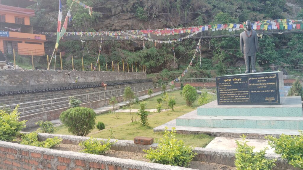 Dupcheshwor Mahadev Temple side view with prayer flags
