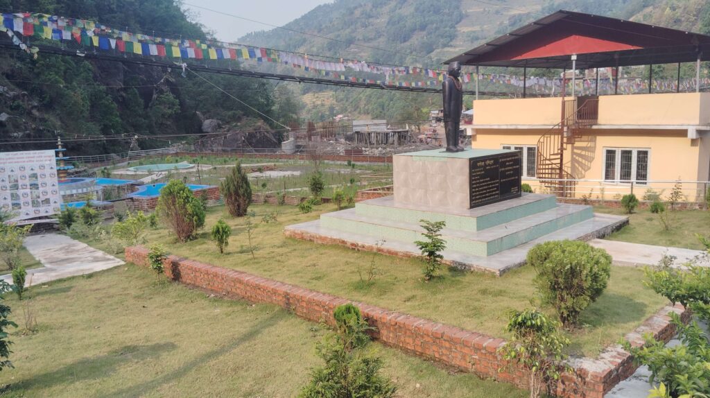 Dupcheshwor Mahadev Temple side view with prayer flags
