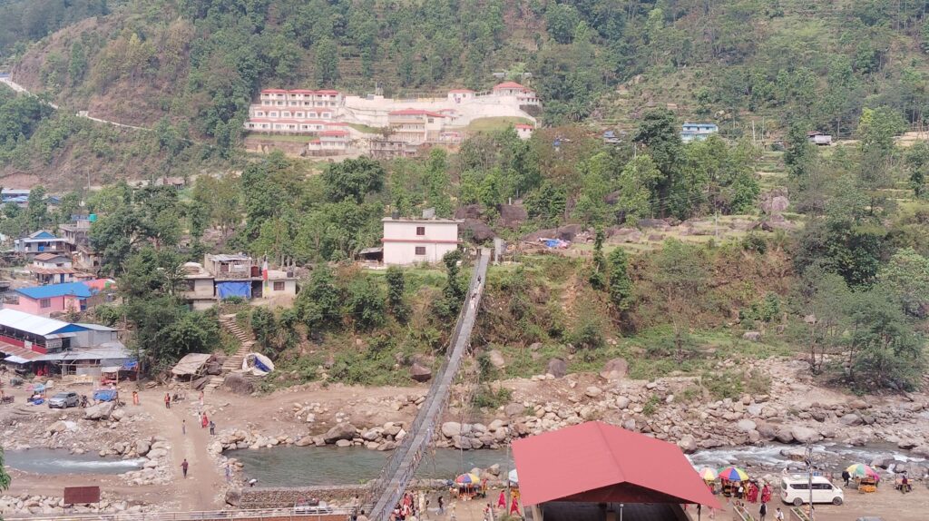 Dupcheshwor Mahadev Temple side view with prayer flags
