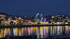 Night view of Lakeside Pokhara with lights and restaurants